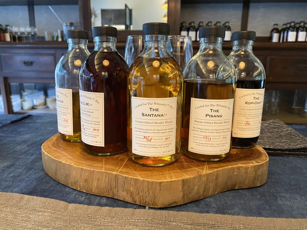 bottles on wooden block